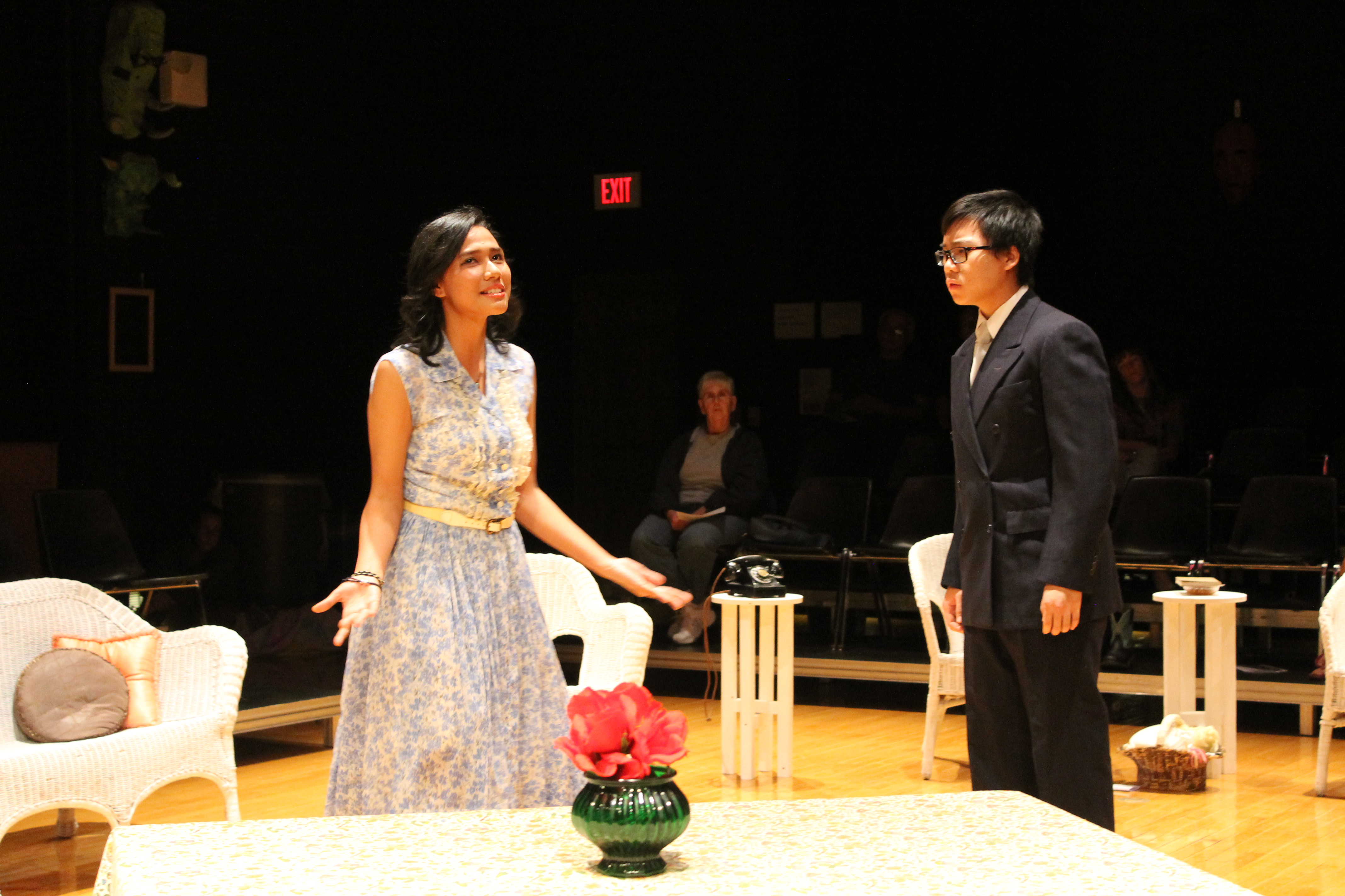 Junior Nadya Dicky and Senior Mike Nguyen on opening night during their dramatic final scene .